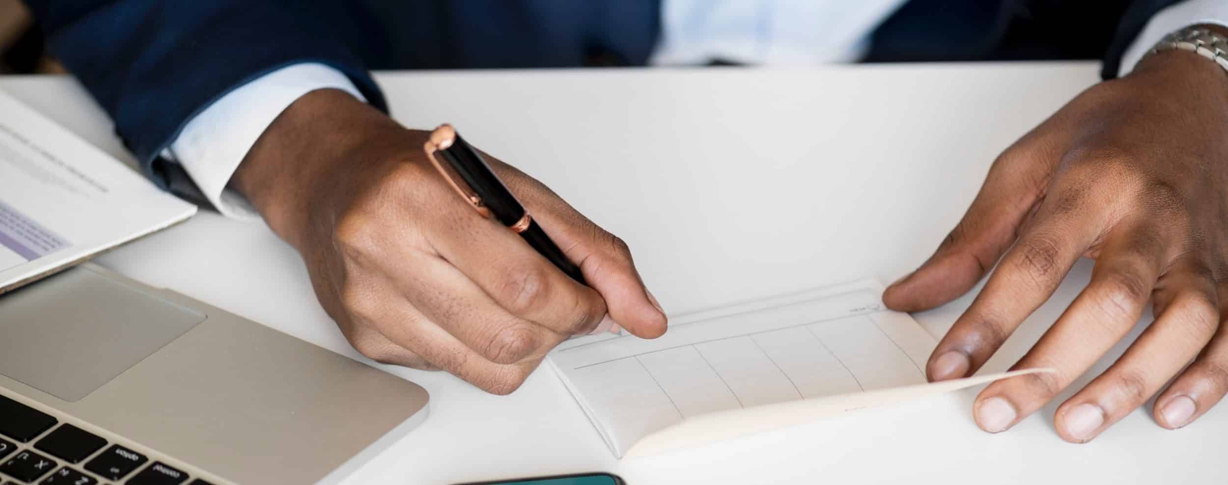 Employer writing termination for employee.