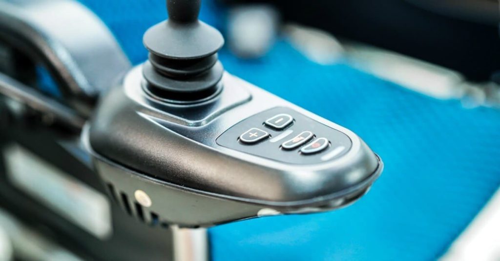 Close-up of the remote control on a wheelchair.