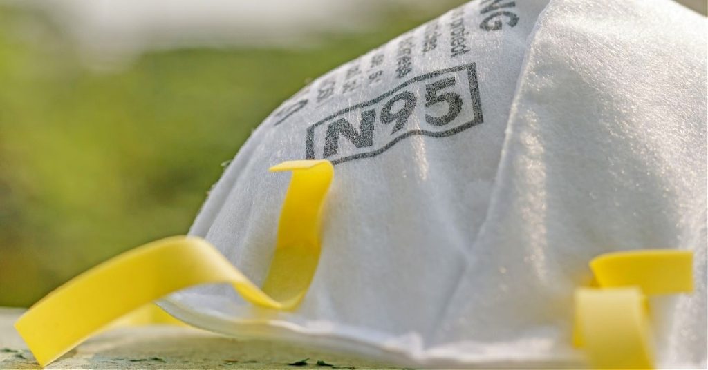 COVID-19 N95 mask laying outside.