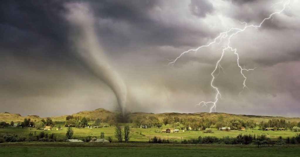 Tornado and lighting strike hitting a small town.