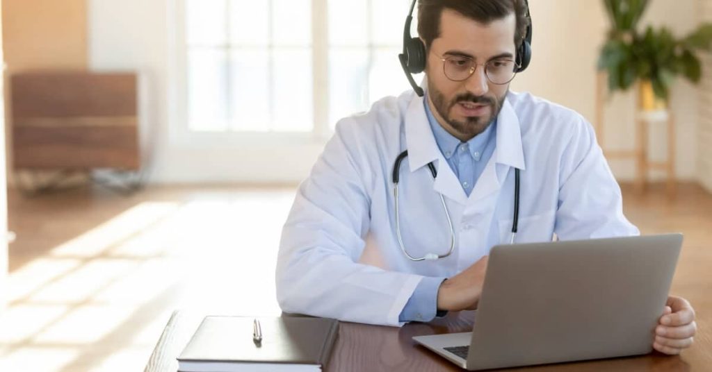 Physician on a video call with a patient.