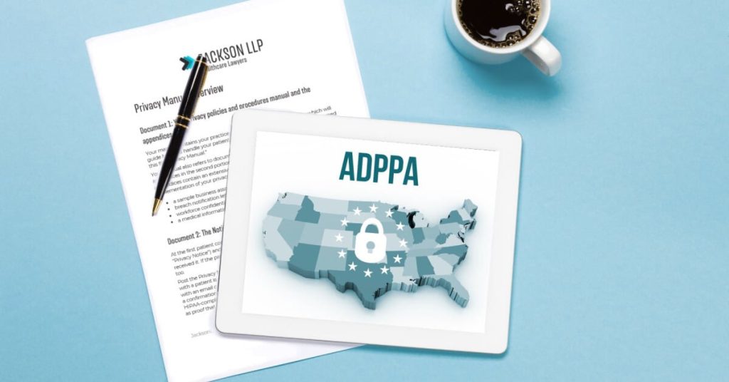 Privacy policy papers on a desk under a tablet