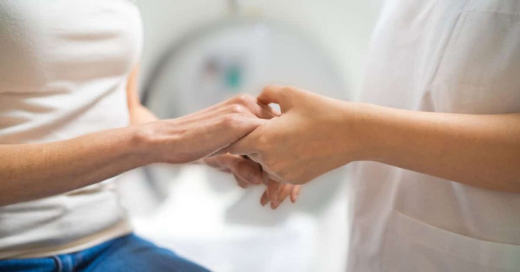 two people holding hands
