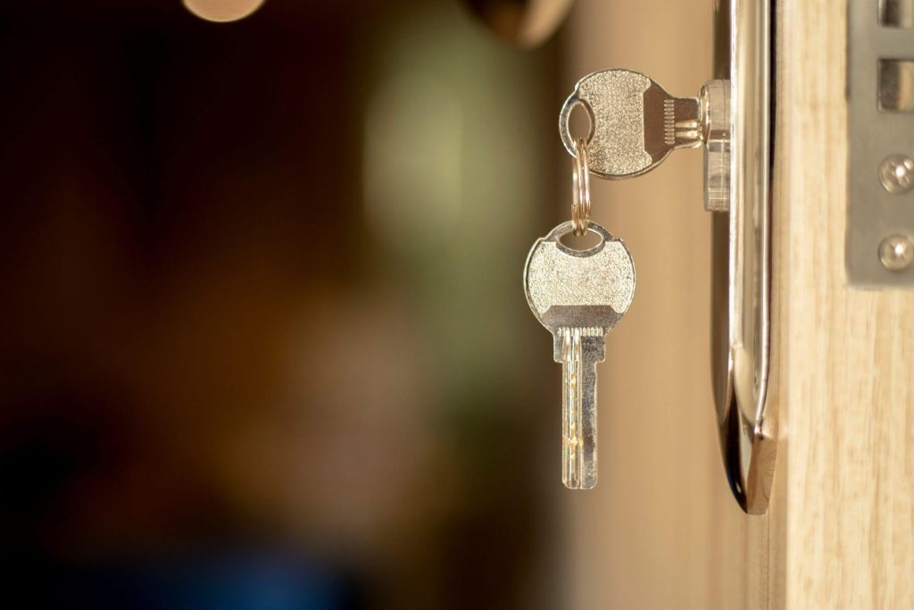 Keys hanging from a door.